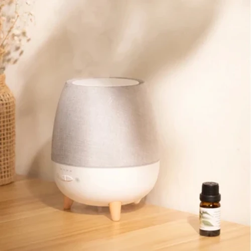 Meaisín cumhartheiripe Deisce Atmaisféar Baile Seomraí Leapa Meaisín Cumhartheiripe Ola Riachtanach Humidifier Diffuser Ultrasonach Fabraic