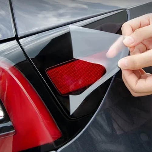 Laadimiskatte kaitsekile 2 tk Tesla mudeli 3/Y 2017-2023 TPU kile kriimustusvastane läbipaistev / must automantli tarvikud
