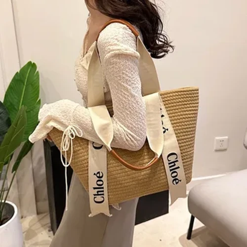 Desain Minat Khusus Gaya Liburan Tas Tote Jerami 2023 Musim Panas Baru Kapasitas Besar Kasual Tenun Tas Besar Portabel untuk Wanita