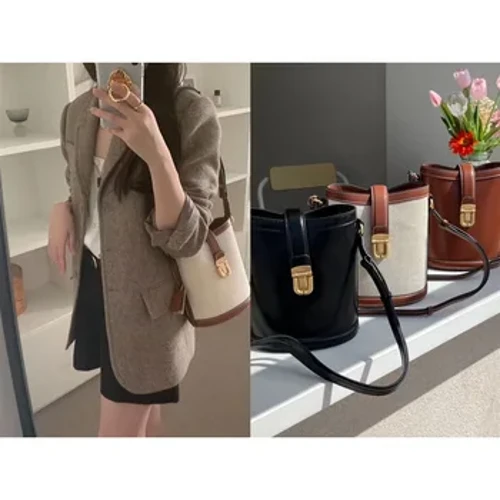 Generation Purchase 2023 New Korean Niche Designer New Joy Xin Rui En the same Cowhide Handbag Bike Bag