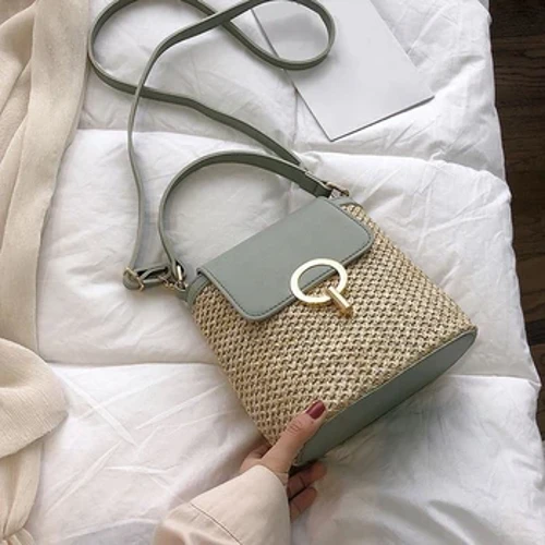 Borsa estiva in tessuto erba con bottone di chiusura nuovo per donna Borsa a secchiello portatile semplice e per il tempo libero Borse a tracolla a spalla singola Temperamento