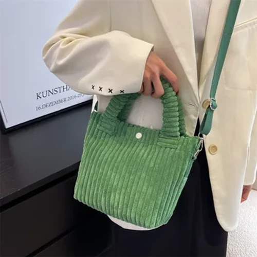 Borsa da donna in velluto a coste moda 2022 Tendenza nuove borse Borse a tracolla a secchiello versatili di nicchia Borse a tracolla con bottone in nylon femminile