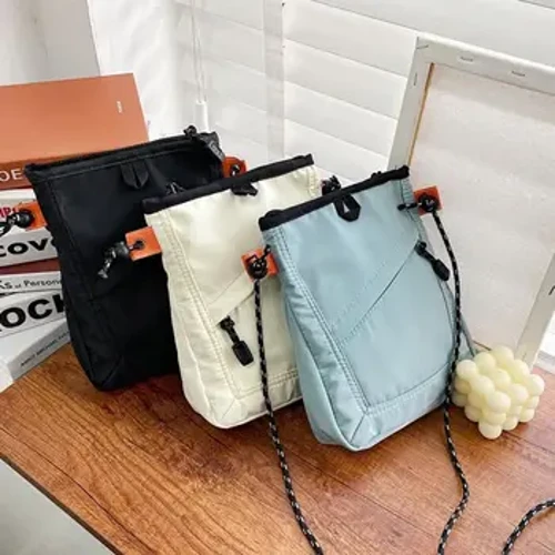 Naujas mados mini vandeniui atsparus kelioninis krepšys Mažas kvadratinis pečių krepšys Vyrams Moteriška rankinė Unisex Crossbody krepšys