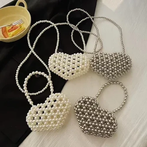 Túi xách nữ mùa hè mới 2024 Love Hand-Wave Pearl Hand Kid's Messenger