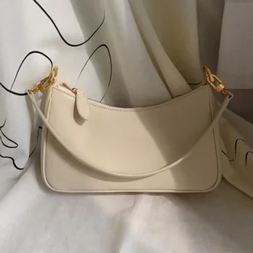 Liten crowdsourcing-väska 2024 new tide French stick underarmsväska axelväska sommar Joker retro chain bag kvinnlig väska handväska
