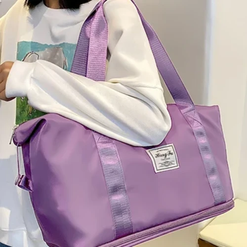 Lawe ʻo UNIXINU i ka ʻeke ʻeke huakaʻi ʻo Nylon Waterproof Sports Gym Tote ʻeke no nā wahine i ka nui o ka mālama ʻana i nā ʻeke lima lima.