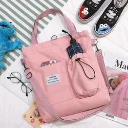 Damska wersja koreańska płócienna torba crossbody studencka wszechstronna torba na ramię w jednolitym kolorze o dużej pojemności