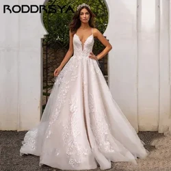 Abito da sposa principessa romantico con applicazioni in tulle. Semplice cinturino per spaghetti. Abito da sposa sexy con scollo a V e allacciatura sul retro