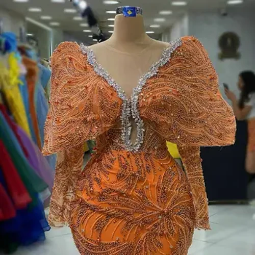 2023 laranja mahuka luze berriena sirena arratsaldeko soinekoak alboko zirrikitu distiratsuak kristal distiratsuak lepoaren inguruan Dubai formal okasio soinekoak