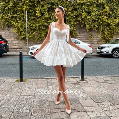 Redamancy White Sweetheart Satin A-LINE Homecoming Dress 2024 Bez záda Tenké šaty nad kolena nové společenské šaty