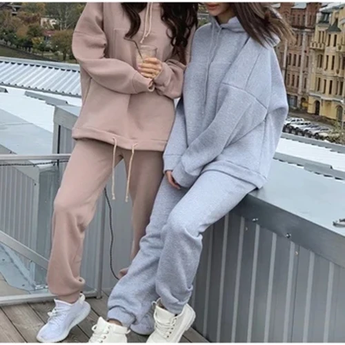 Kūʻai wela ʻEulopa a me ʻAmelika Hui Pū ʻIa a me ka Autumn New Fashion Big Pocket Solid Color Sweater Leisure Two-piece Set