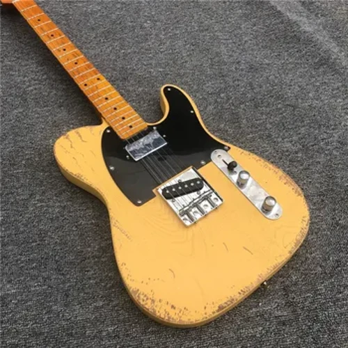 Sa stock, ginamit ang ash yellow na de-kuryenteng gitara, mga totoong larawan, nako-customize, wholesale at retail ng factory. Libreng pagpapadala