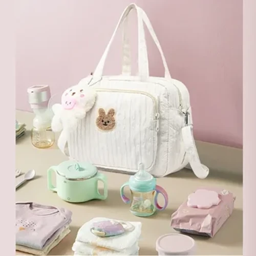 Baby bleposer Arrangør Maternity Bag Bærbar sød tegneserie Multi-funktion Stor kapacitet Nylon Mor Rejser Tote med vedhæng