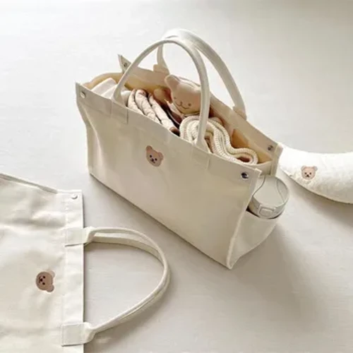 Ins Koreanesch Mommy Bag Nei Multi-Funktioun Grouss Kapazitéit Outing Mamm a Baby Bag Portable Canvas Mamm a Baby Bag