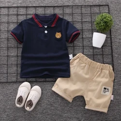 Quần Áo Bé Trai Trẻ Em Mùa Hè Quần Áo Polo Bộ Bé Trai Ngắn Cho Bé Tay Áo Thun Trẻ Em Thể Thao Phù Hợp Với 2 Chiếc Cotton 1-5y