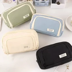 Une trousse à crayons multicouche de grande capacité, une boîte de papeterie polyvalente Simple pour étudiants et un sac de rangement de maquillage
