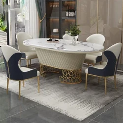 Bộ bàn ăn sang trọng với 6 ghế da inox và bàn đá cẩm thạch hình bầu dục - Hoàn hảo cho trang trí nhà bếp và phòng ăn