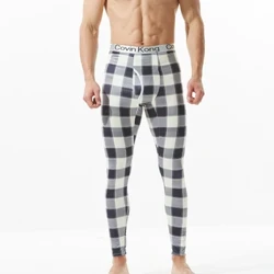 O tama'ita'i La'ei'ele'ele fa'avevela e fa'afeiloa'i le pa'u ofuvae mafanafana o le taumalulu Long Johns tama'ita'i vaivai fa'a'u'u fe'avea'i lapopo'a leggings fa'alelei fa'alava.
