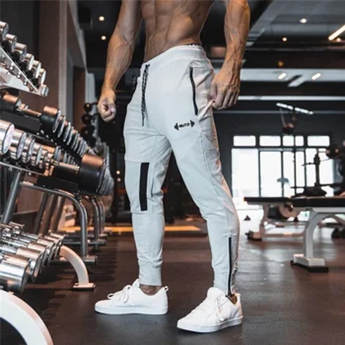 2023 Yeni Erkek Eşofman Altı Spor Salonları Spor Spor pantolon Vücut Geliştirme Joggers Egzersiz Pantolon Erkekler Zip cep Pamuk Kalem Pantolon erkekler