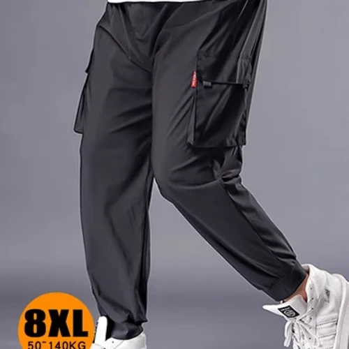 Celana panjang pria ukuran gedhe musim semi lan musim gugur overalls celana longgar pria plus gemuk plus celana kasual