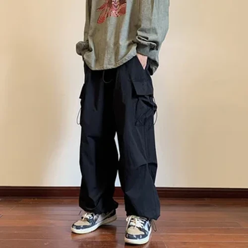 Streetwear 2023 Spring Harem Suruali ya Kawaida Wanaume Elastic Kiuno Rangi Imara Suruali ya Mizigo Suruali Mingi Mifuko Miguu Miguu Kwa Wanawake