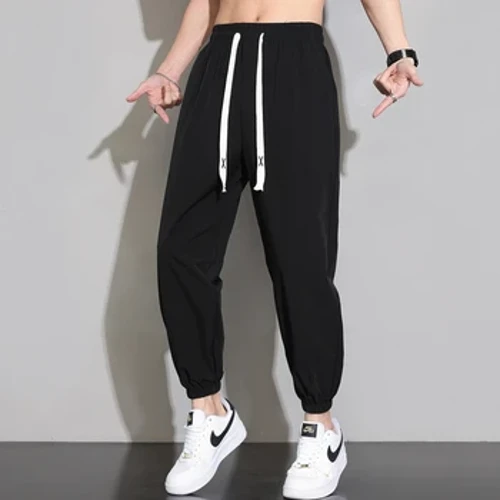 Erkekler Trendy Basit Rahat Spor Joggers Buz Ipek harem pantolon 2024 Yaz Erkek Katı Gevşek Cepler Kırpılmış Sweatpants Pantalones