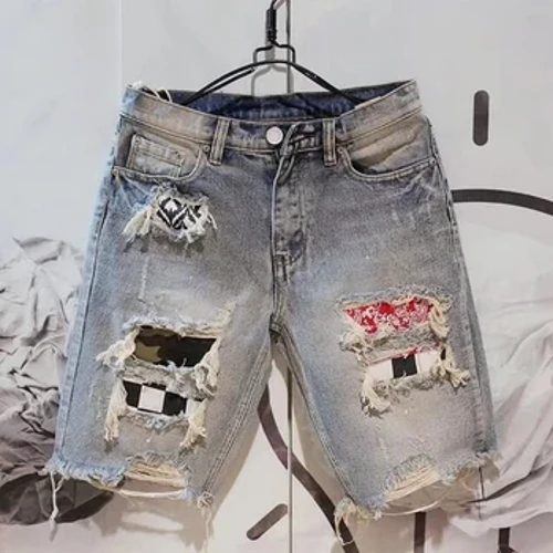Pantaloni corti per uomini estivi in ​​denim mendicante di moda per la moda raschiava i pantaloncini da cinque pezzi