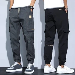 Calças masculinas na moda tecido macio multi bolsos cintura elástica primavera verão calças de carga resistente ao desgaste calças jogger roupas simples