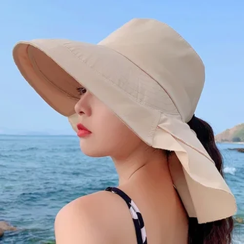 pulou o le tau mafanafana o tama'ita'i mo le la i le pito o le la e puipui ai le ua o le la o le la Beach bucket pulou e mafai ona gaugau i'u vae Malaga Panama pulou tama'ita'i.