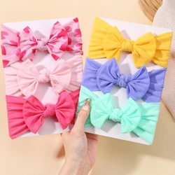 Nā waihoʻoluʻu candy i ke kāʻei lauoho pēpē i ka ʻaoʻao ākea i ke poʻo o nā keiki kaikamahine Boutique elastic Protect Turban headwear no nā mea lauoho keiki.