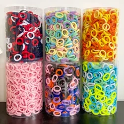 100 pcs koloretsua oinarrizko nylonezko ile-gorbata neskentzako zaldi-buztan eusteko gomazko gomazko zinta kid moda haurtxoentzako ile osagarriak